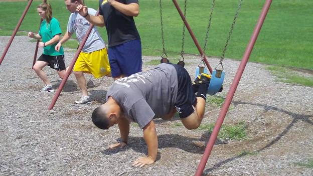 C:\Users\John\Desktop\VHW movies\Play Ground Workouts\Swing Atomic Push Up Frame - 69.jpg
